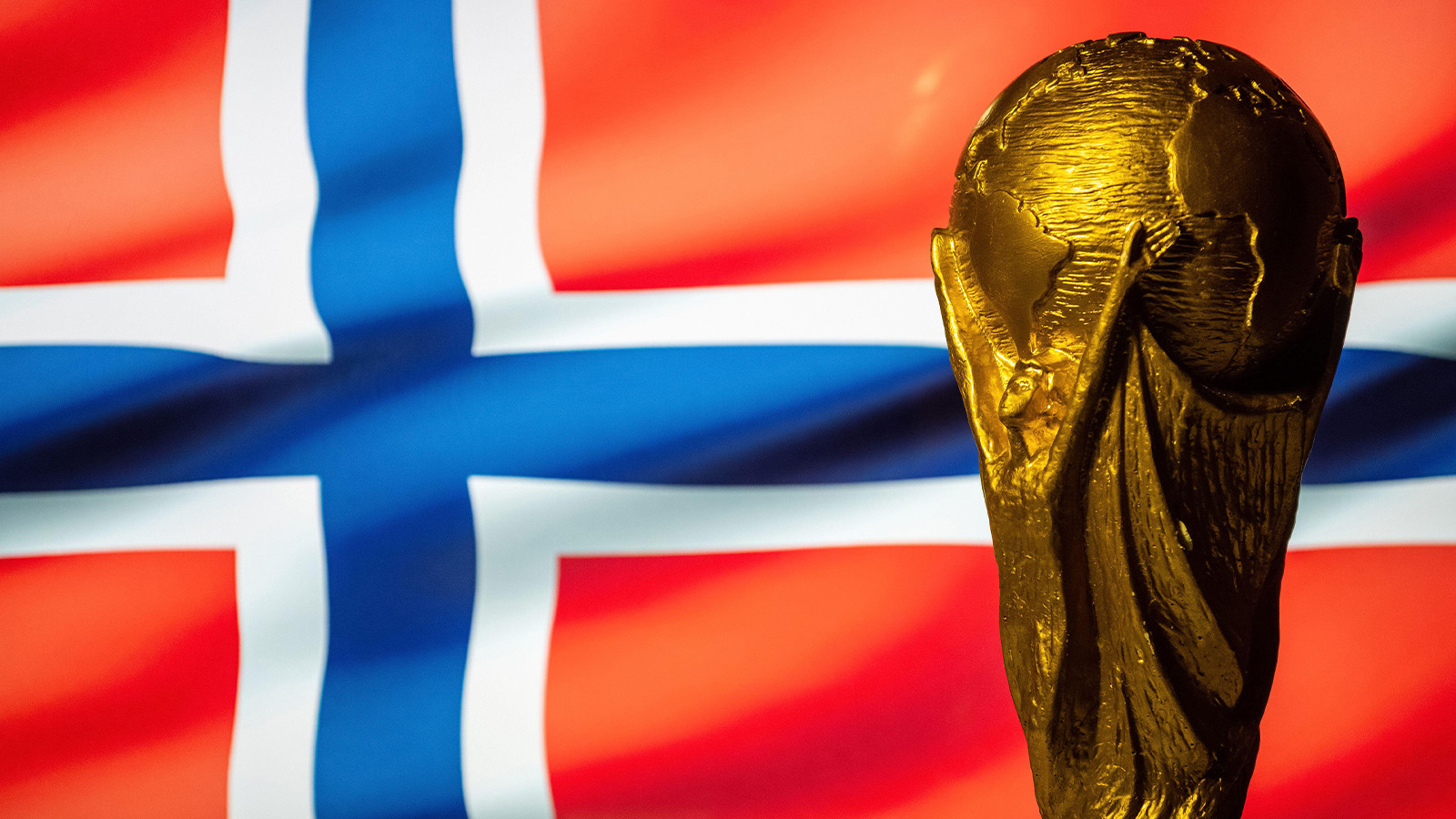 **6 oktober 2021, Oslo, Norge. Fotbolls-VM (FIFA World Cup) i bakgrunden tillsammans med Norges flagga.**