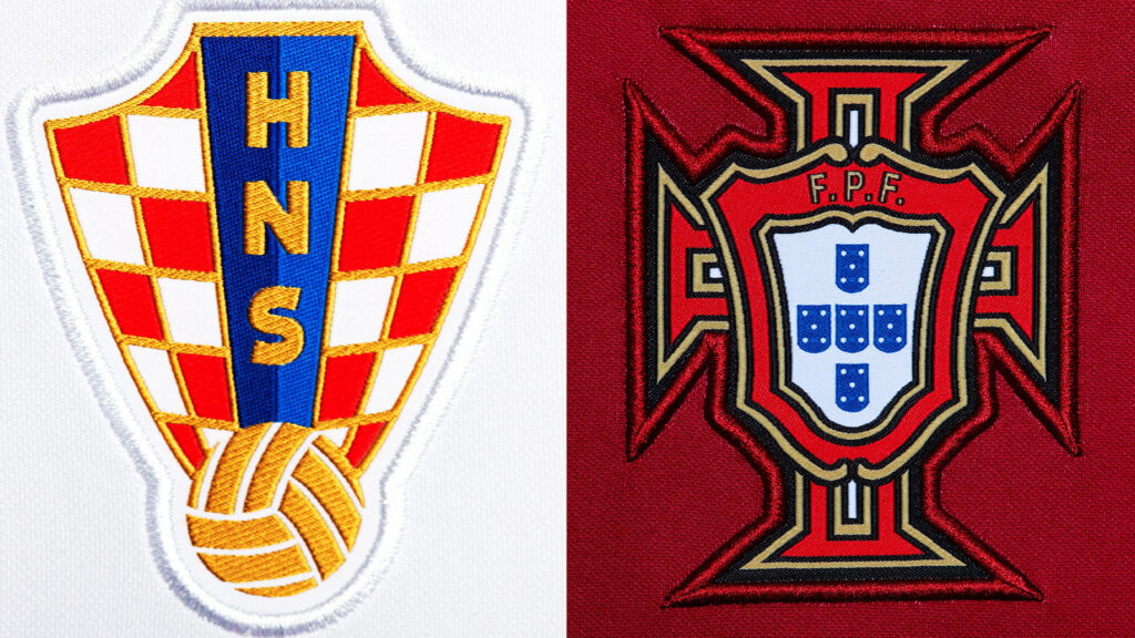 **Närbild av landslagsemblemet på matchtröjan under fotbolls-VM i Qatar 2022.**